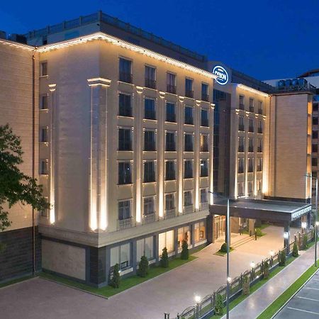 Orion Hotel Bisjkek Buitenkant foto Hilton Prague