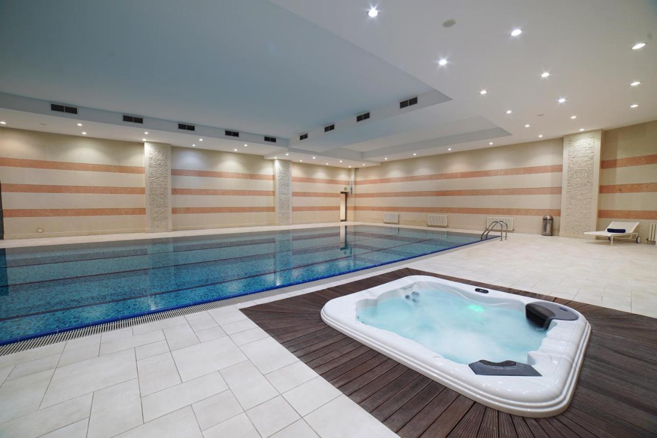 Orion Hotel Bisjkek Buitenkant foto A spa