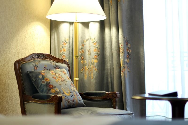 Orion Hotel Bisjkek Buitenkant foto Curtains and upholstery