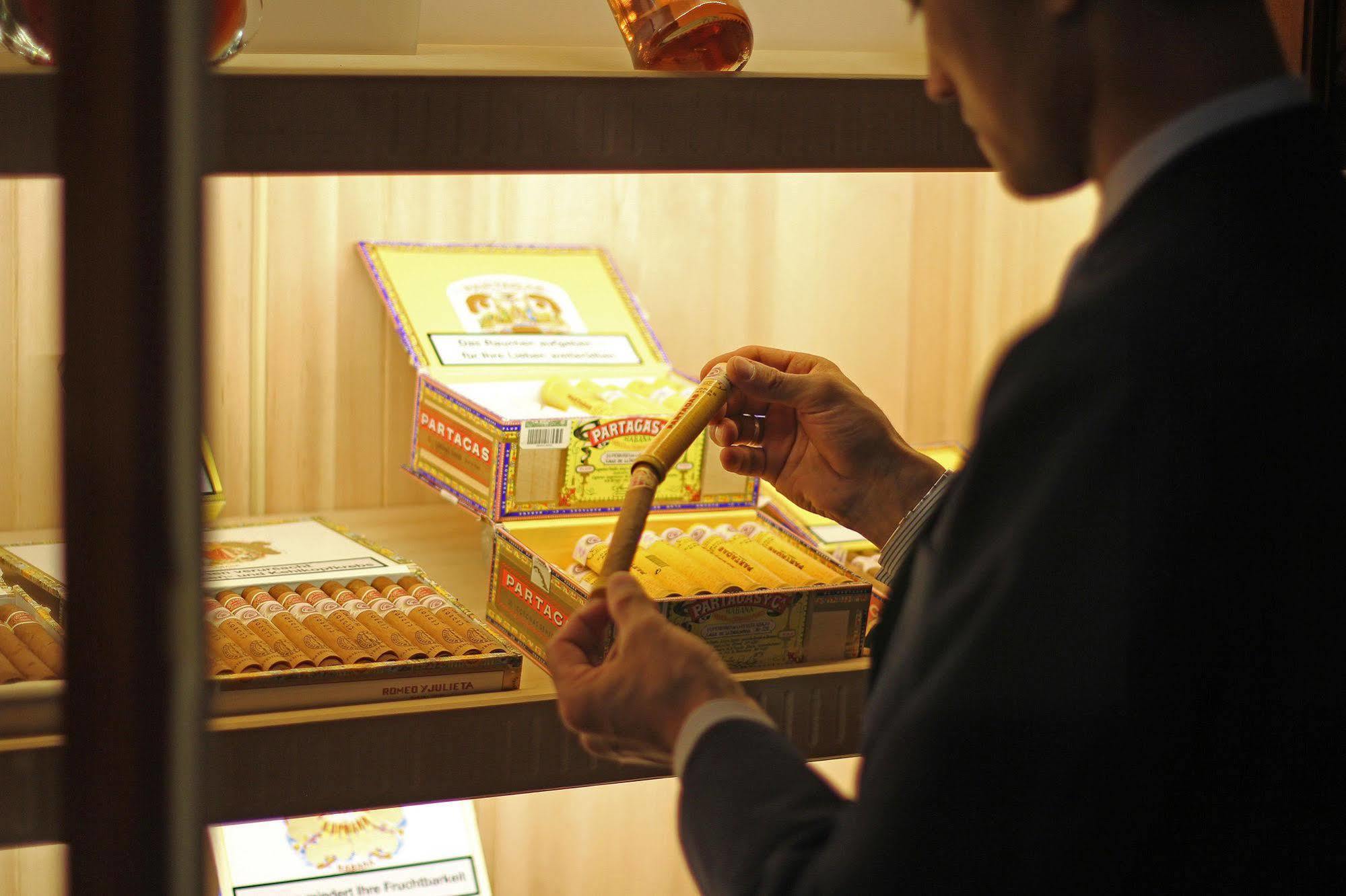 Orion Hotel Bisjkek Buitenkant foto A cigar shop in Madrid, Spain