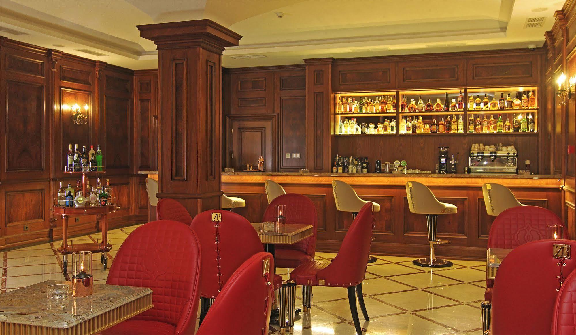 Orion Hotel Bisjkek Buitenkant foto The bar at the Savoy